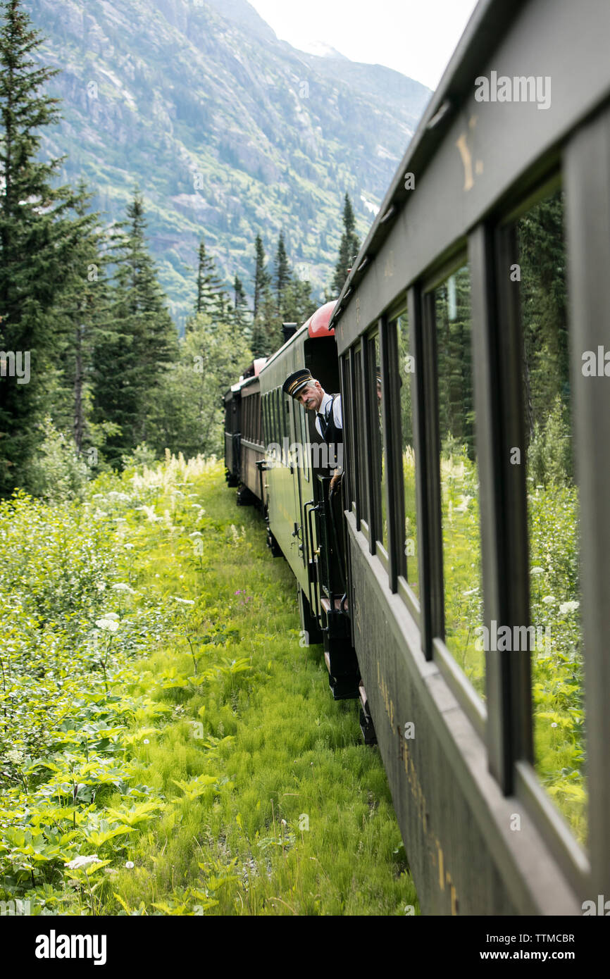 USA, Alaska, Sitka, one of the train conductors aboard the White Pass