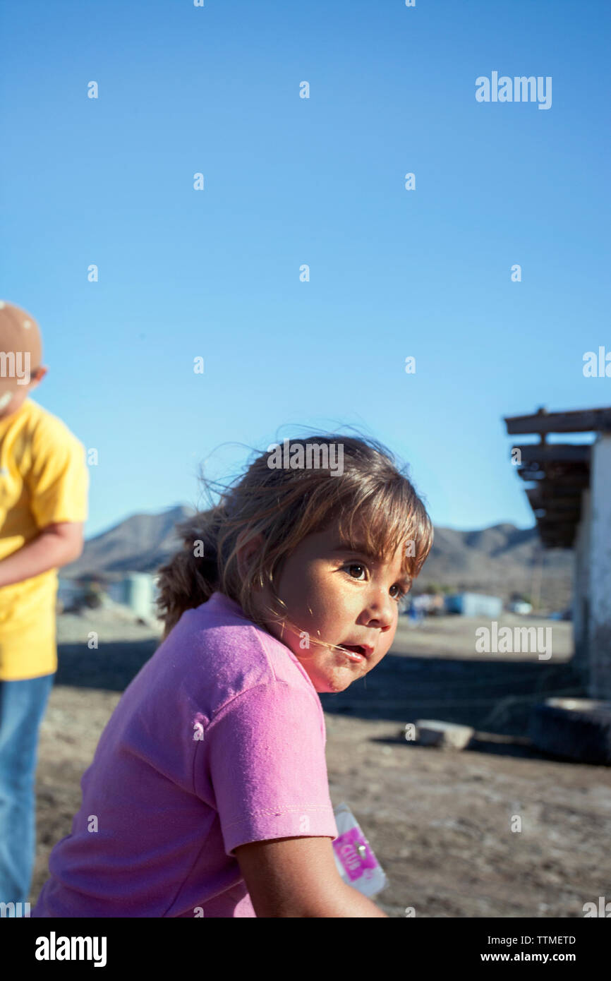 MEXICO, Baja, Magdalena Bay, Pacific Ocean, a young local girl on Isla Magdalena Stock Photo