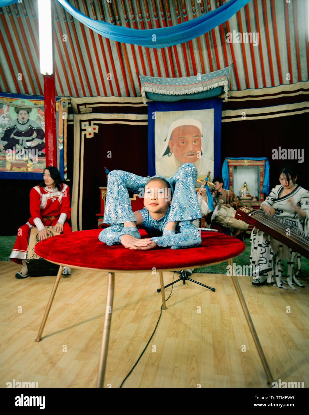MONGOLIA, Ulaanbaatar, a young acrobat performs at the Abtai-Sain Khan Palace Stock Photo
