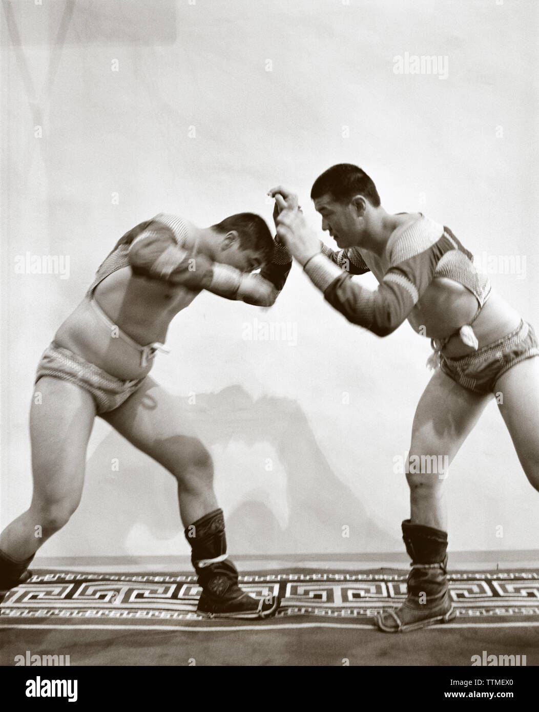 MONGOLIA, Ulaanbaatar, portrait of Mongolian wrestlers in traditional