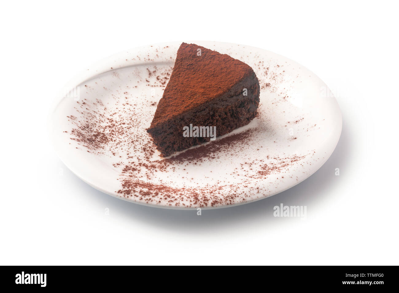 A Piece Of Chocolate Cake With Cocoa Powder On Top On A Plate Isolated On White Background Stock Photo Alamy