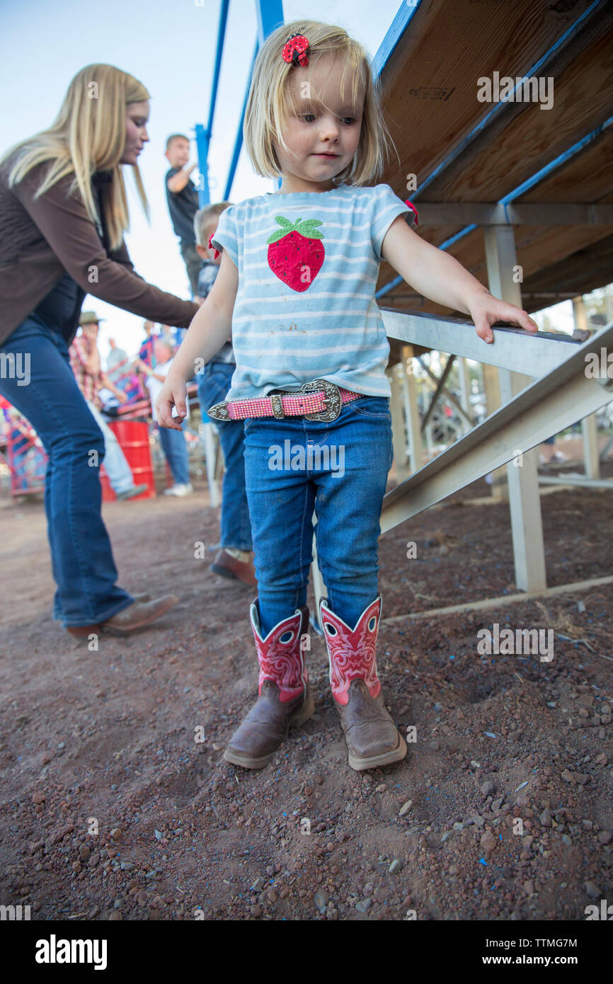 USA, Oregon, Sisters, Sisters Rodeo, children watching the events at