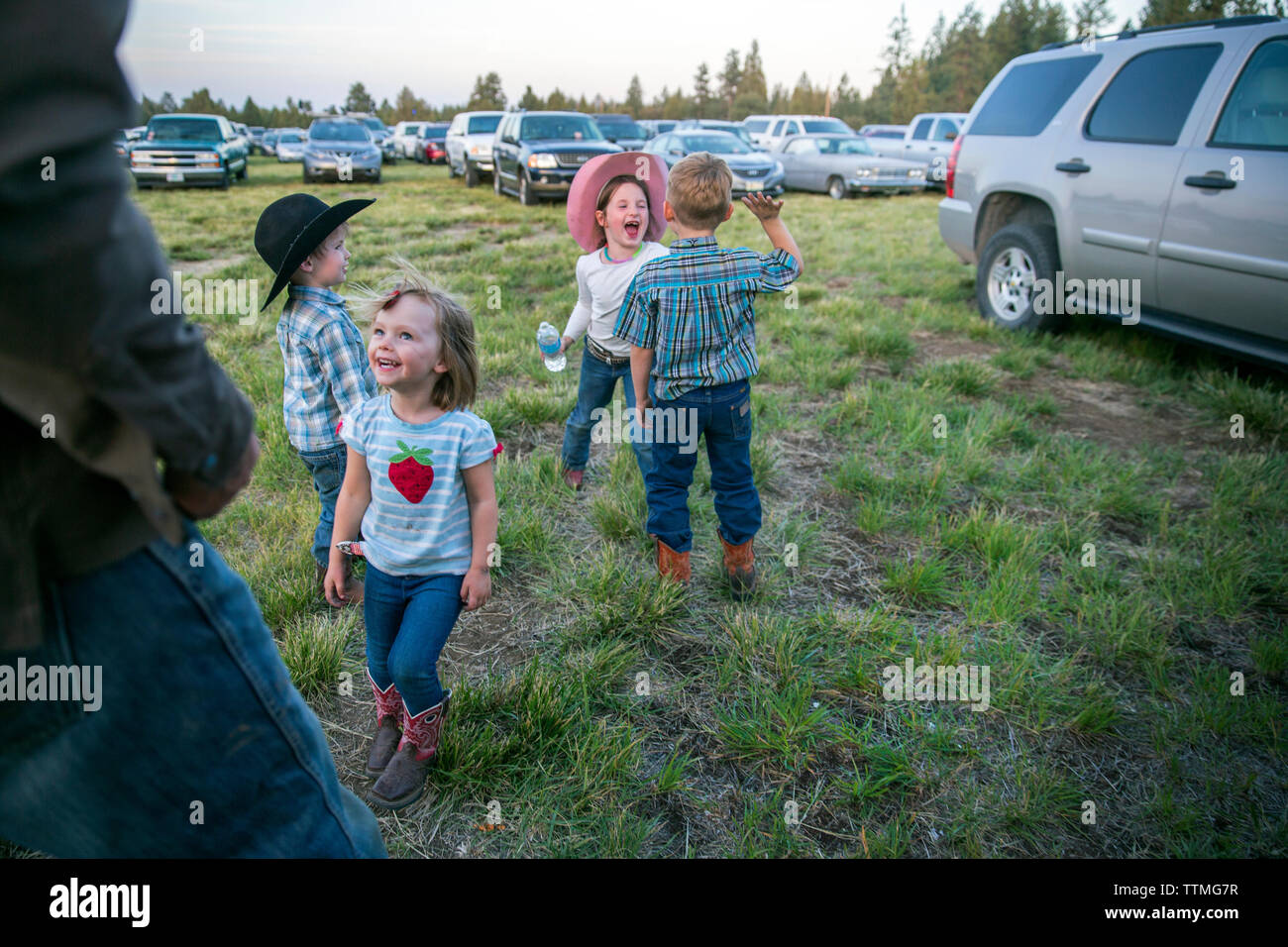USA, Oregon, Sisters, Sisters Rodeo, children playing on the grounds of