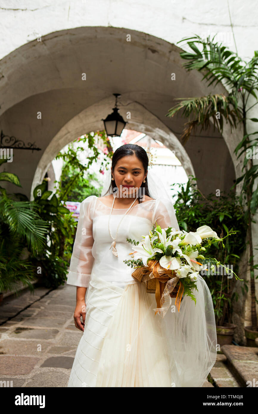 PHILIPPINES, Manila, portrait of Ana Ma-An, a bride before her wedding in the Intramros District Stock Photo