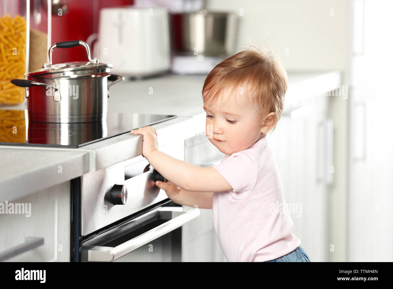 Child pot stove hi-res stock photography and images - Alamy