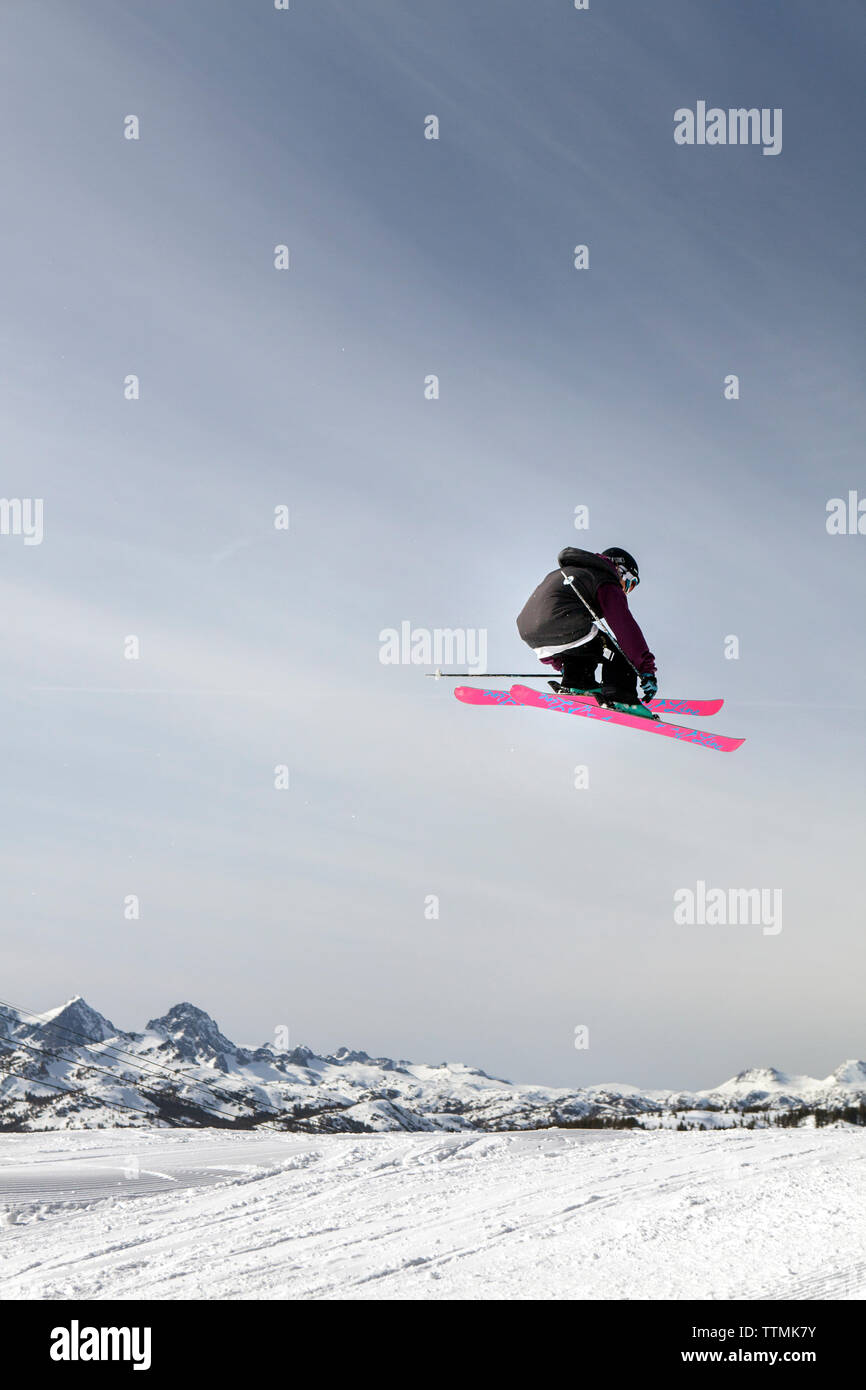 USA, California, Mammoth, a skiier catches air off a jump at Mammoth Ski Resort Stock Photo