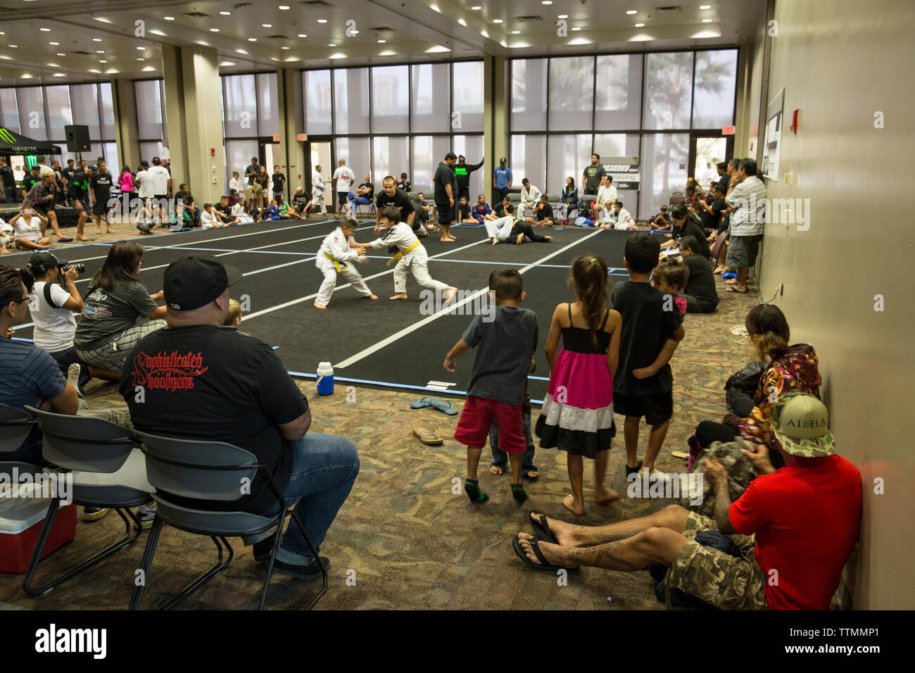 USA, Oahu, Hawaii, young boy Jujitsu Martial Arts fighters grapple at