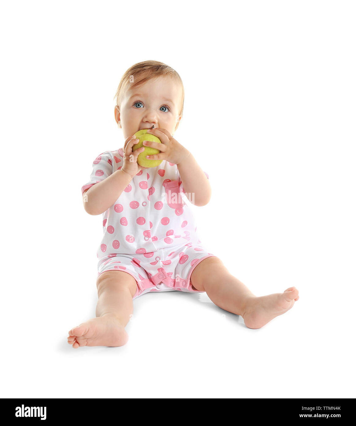Cute baby girl with apple, isolated on white Stock Photo Alamy