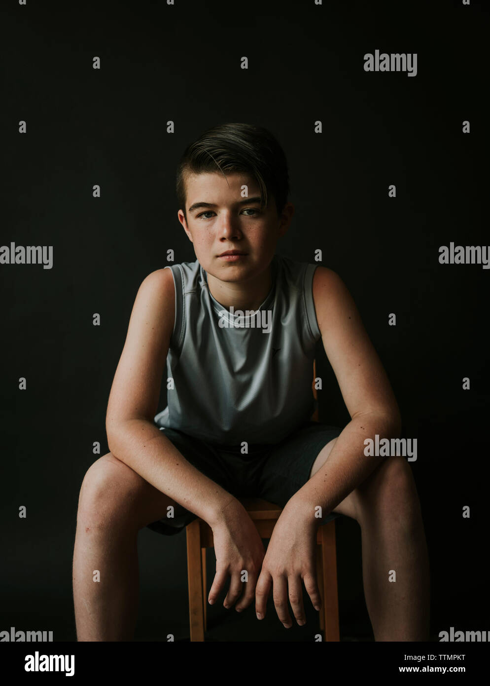 Boy Sitting On Stool High Resolution Stock Photography and Images - Alamy