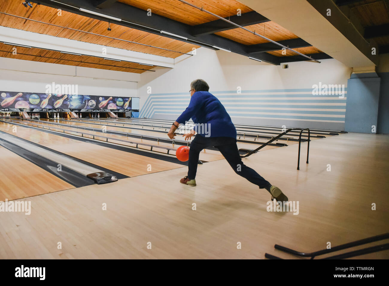 Bowling Ball Going Down Lane