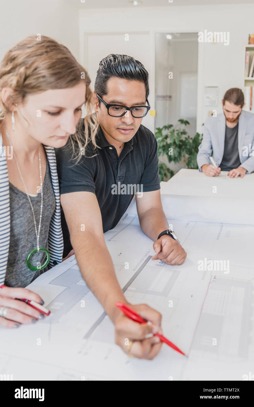 Interior designers working in office Stock Photo
