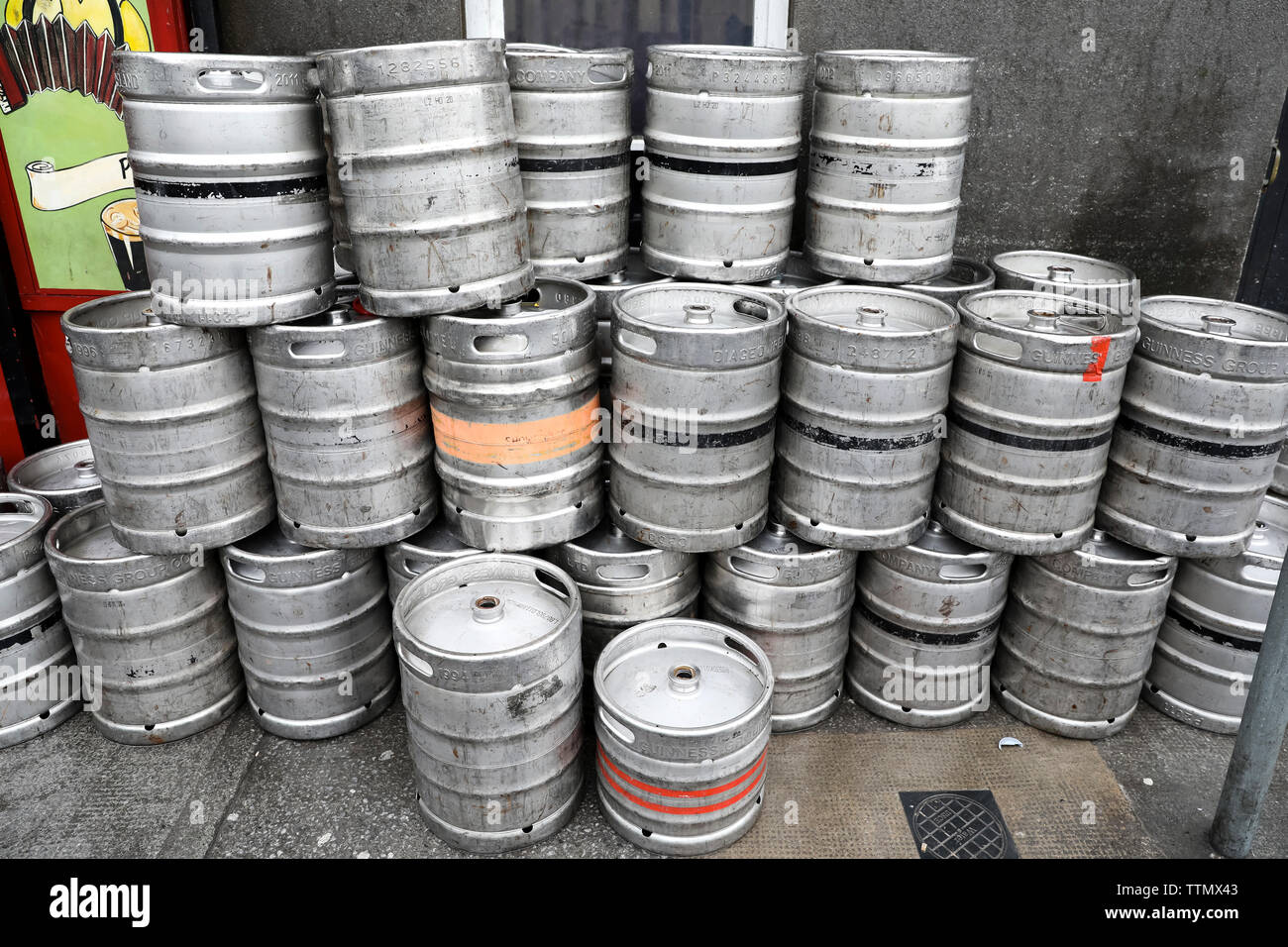 Beer Kegs Stacked up Against Wall in Galway, Ireland Stock Photo