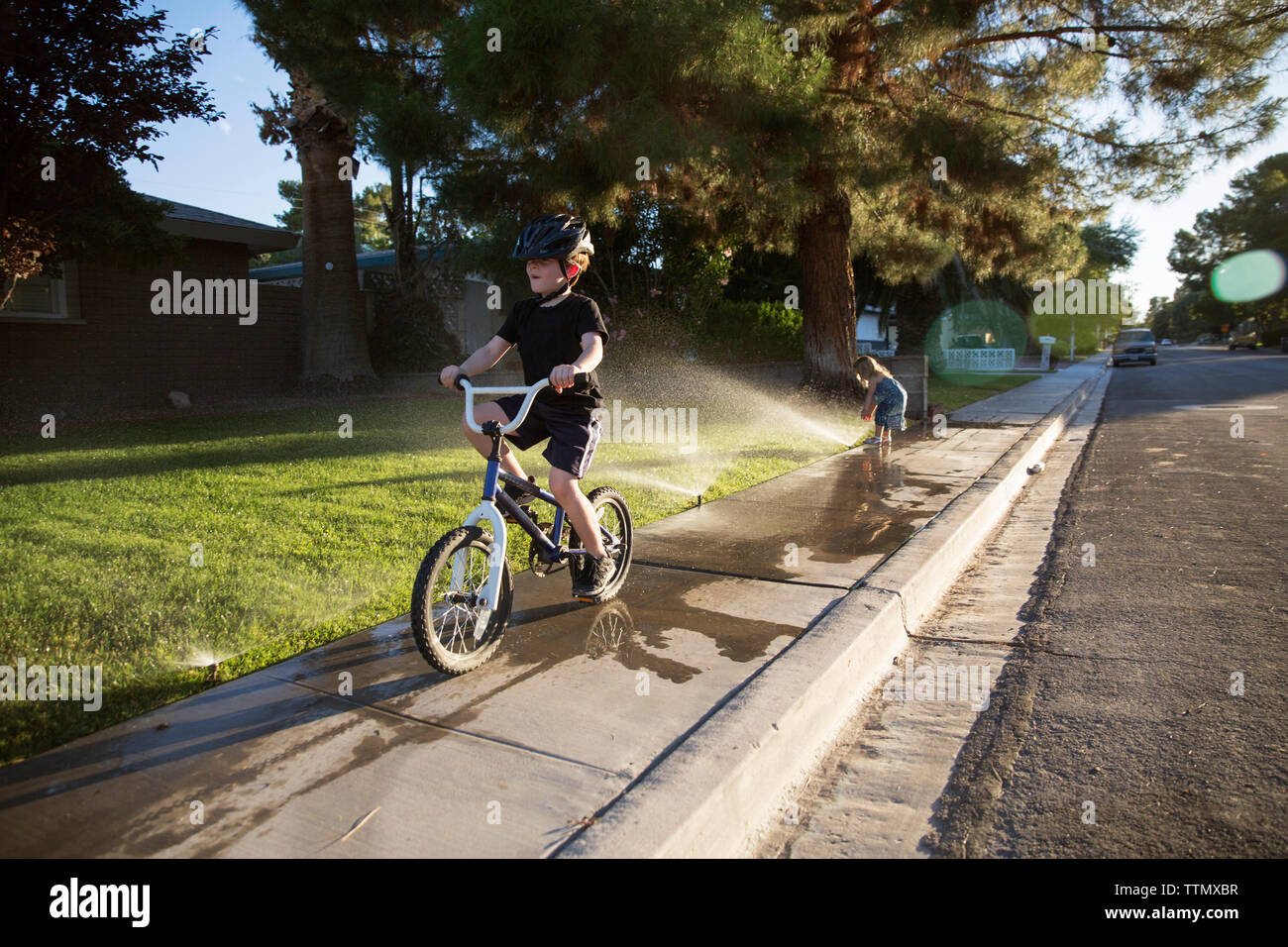 riding bike on sidewalk