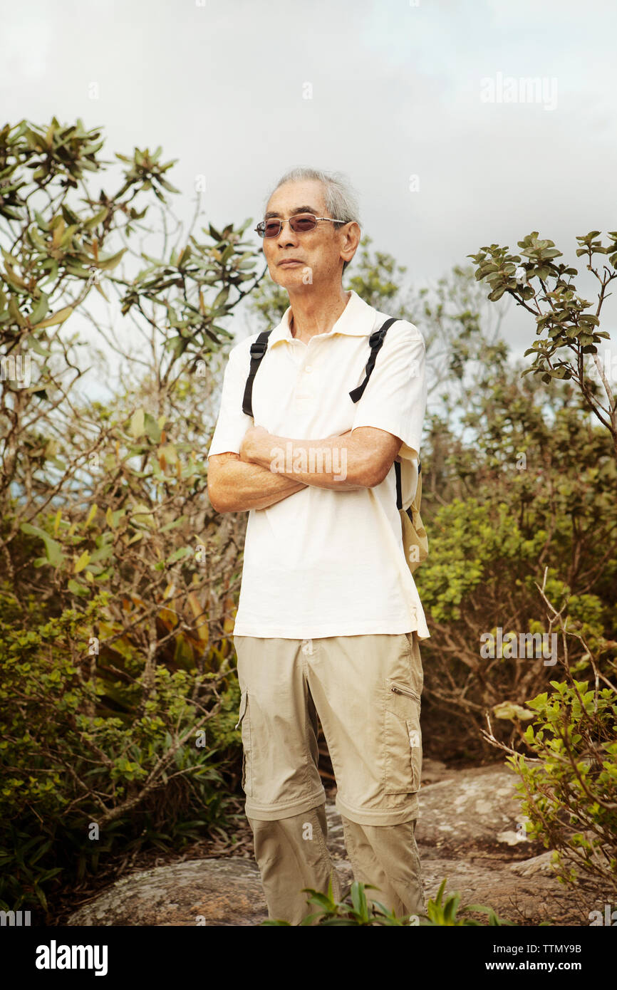 Senior man arms crossed hi-res stock photography and images - Alamy