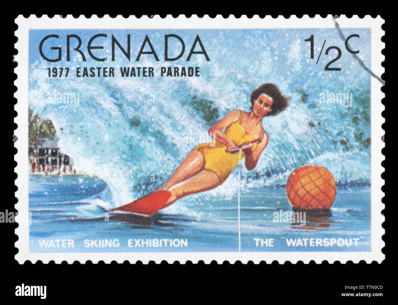 GRENADA - CIRCA 1977: A stamp printed in Grenada issued for the easter water parade shows skiing exhibition, circa 1977. Stock Photo