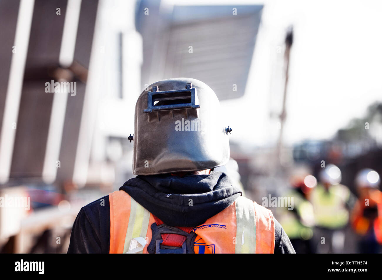 Rear view of construction worker at site Stock Photo