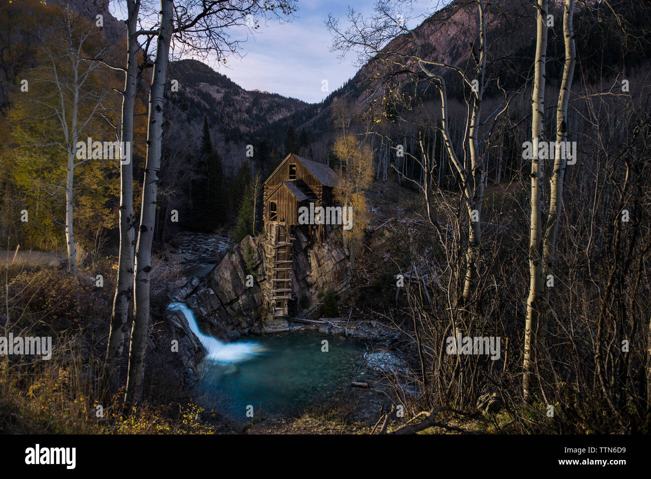 View of Crystal Mill against mountains Stock Photo