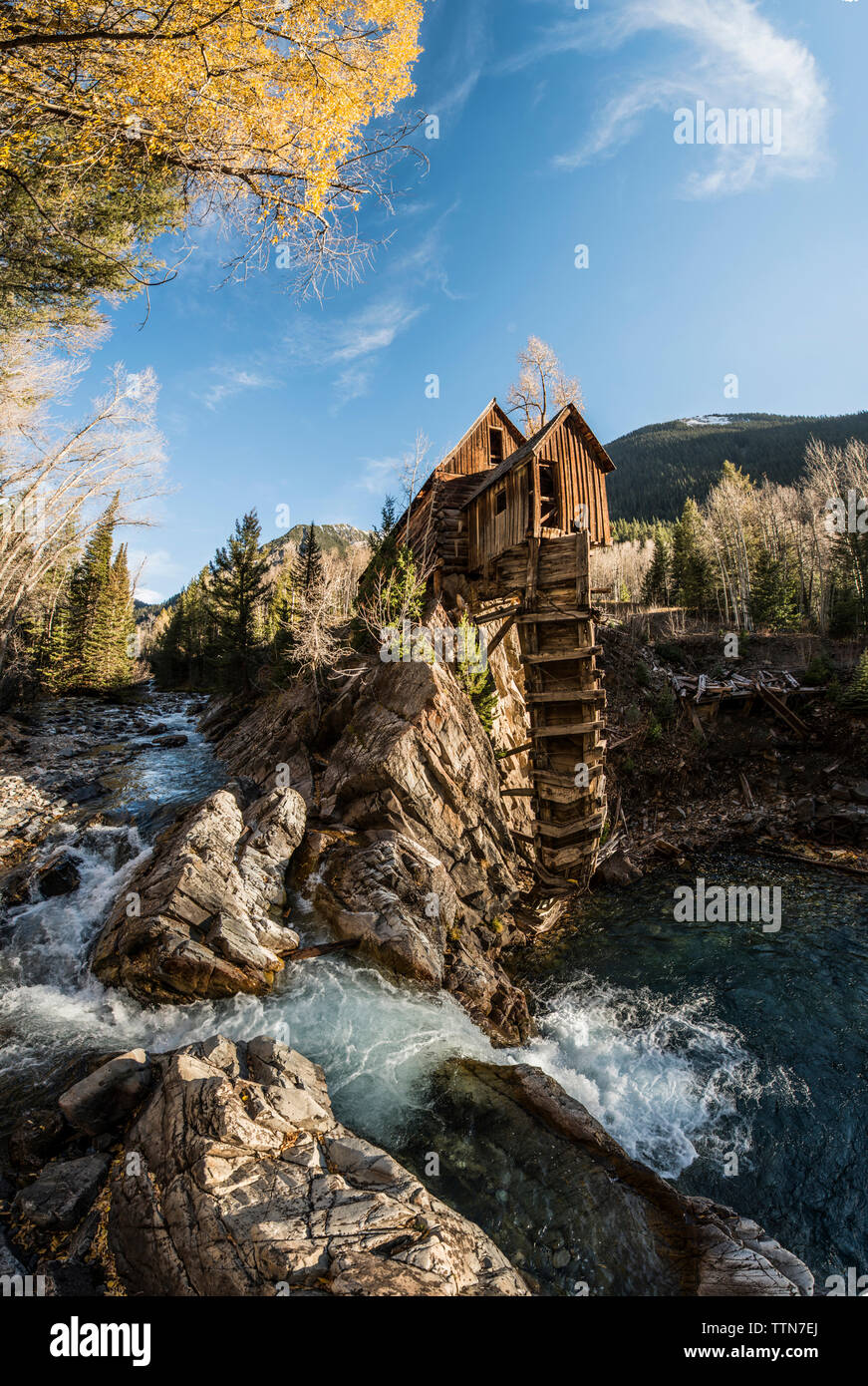 Scenic view of Crystal Mill by river against sky Stock Photo