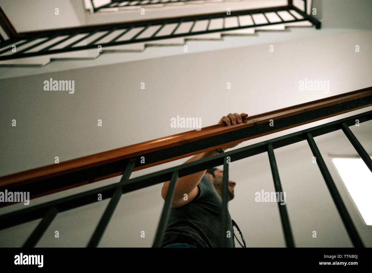 Walking up steps man hi-res stock photography and images - Alamy