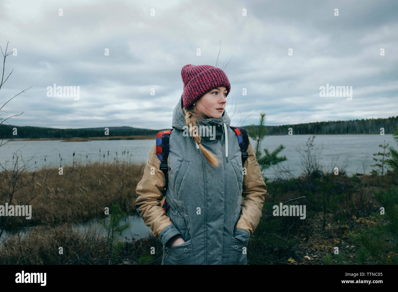 Beautiful girl by the river Stock Photo - Alamy