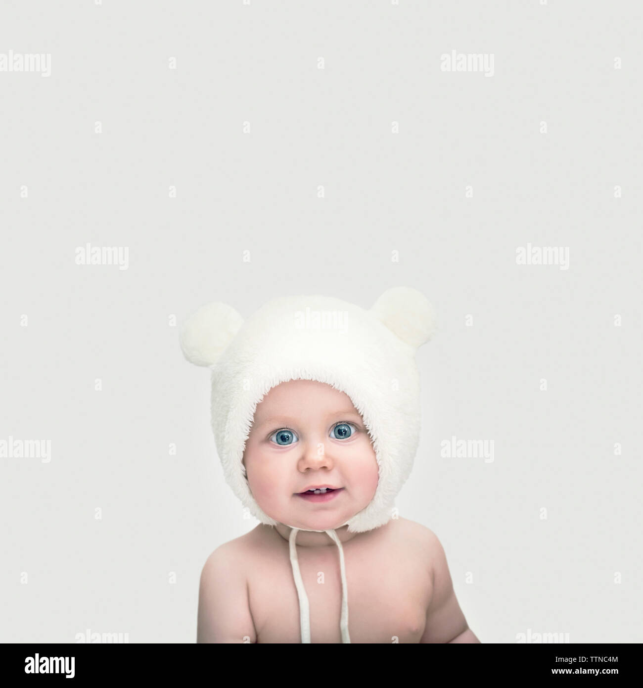 Cute baby in a hat with ears Stock Photo