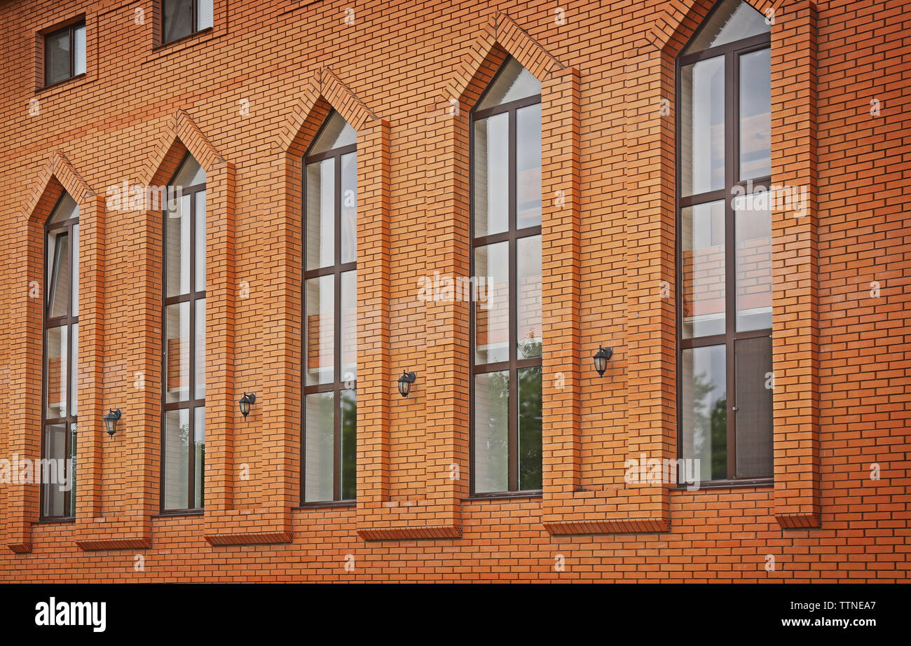 Facade of brick building with lancet windows Stock Photo Alamy