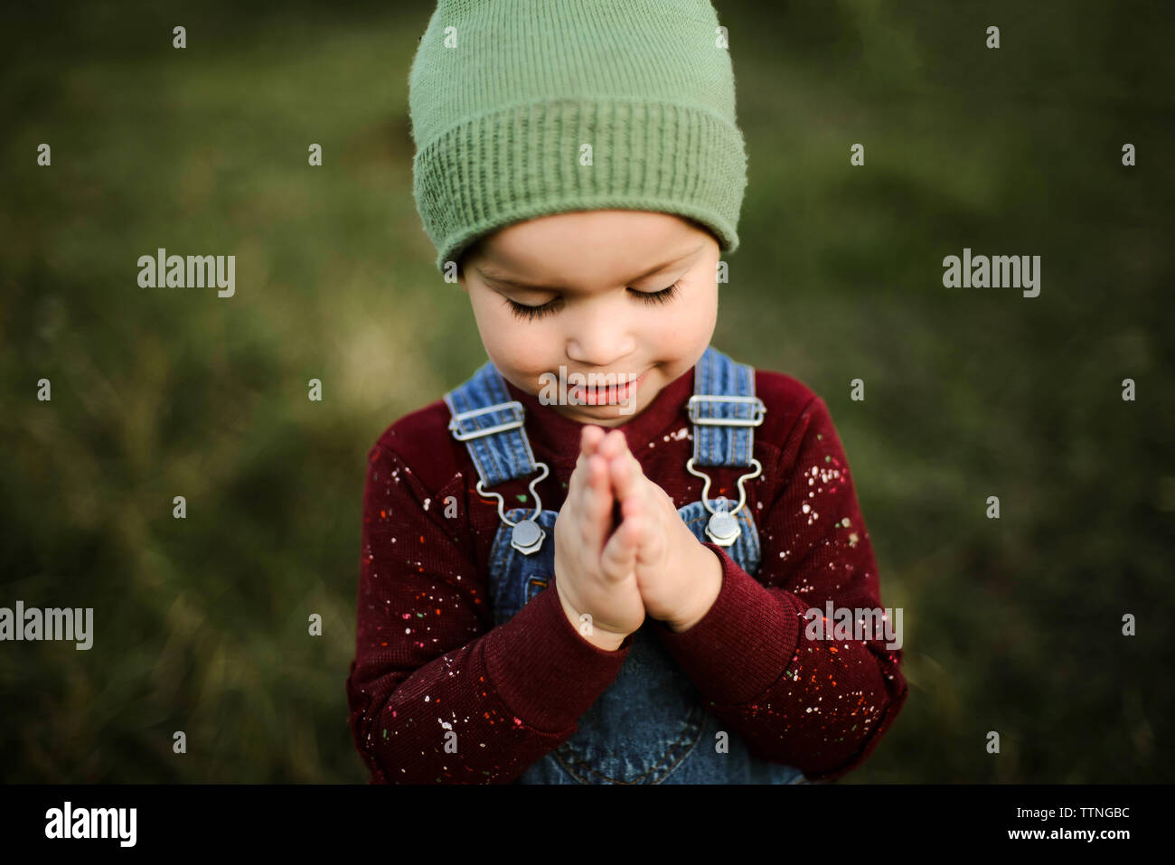 Portrait of little adorable boy standing outdoor Stock Photo - Alamy