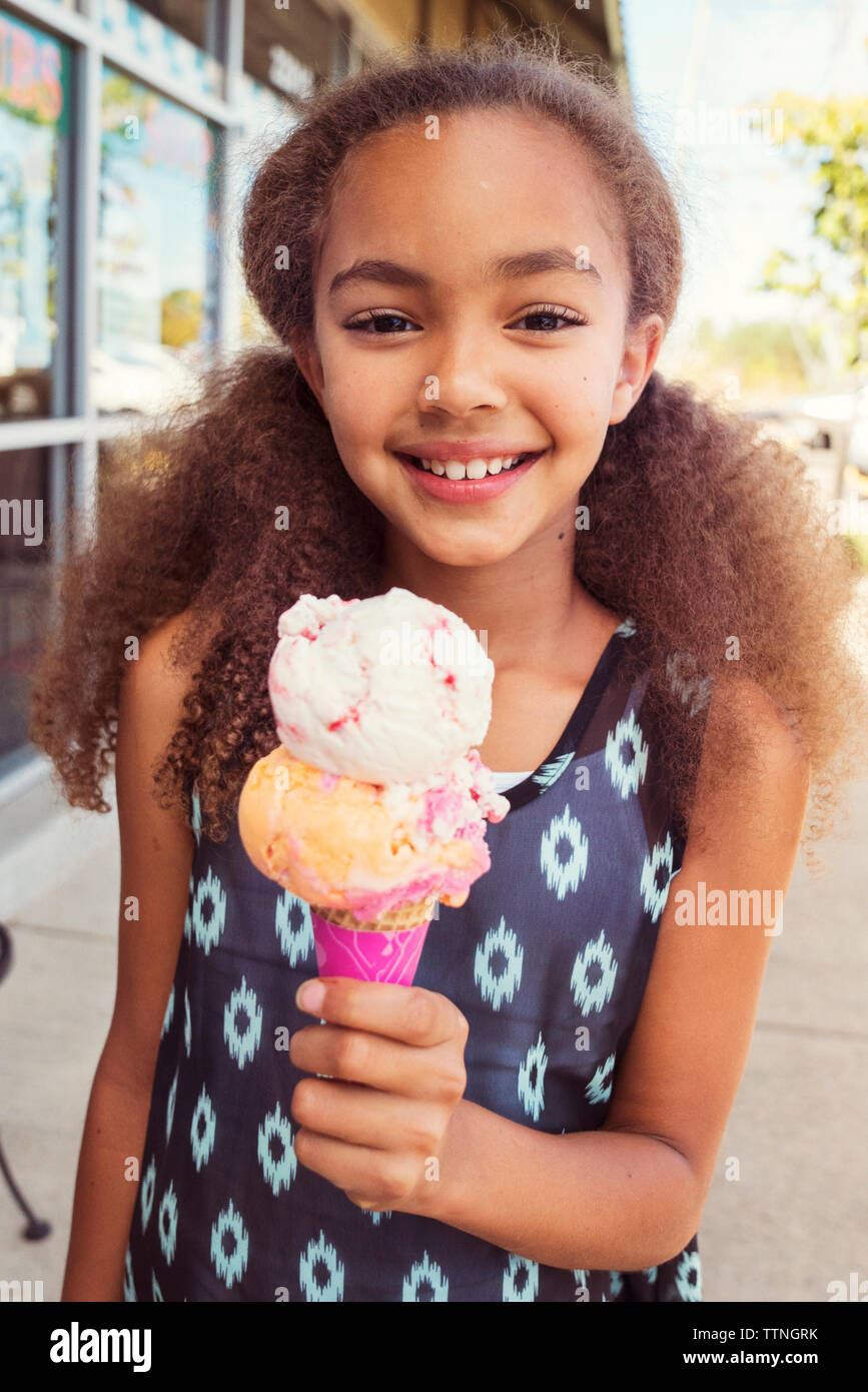 Portrait Of Girl Holding Ice Cream Stock Photo Alamy Portrait Of Girl Holding Ice Cream Stock Photo Alamy