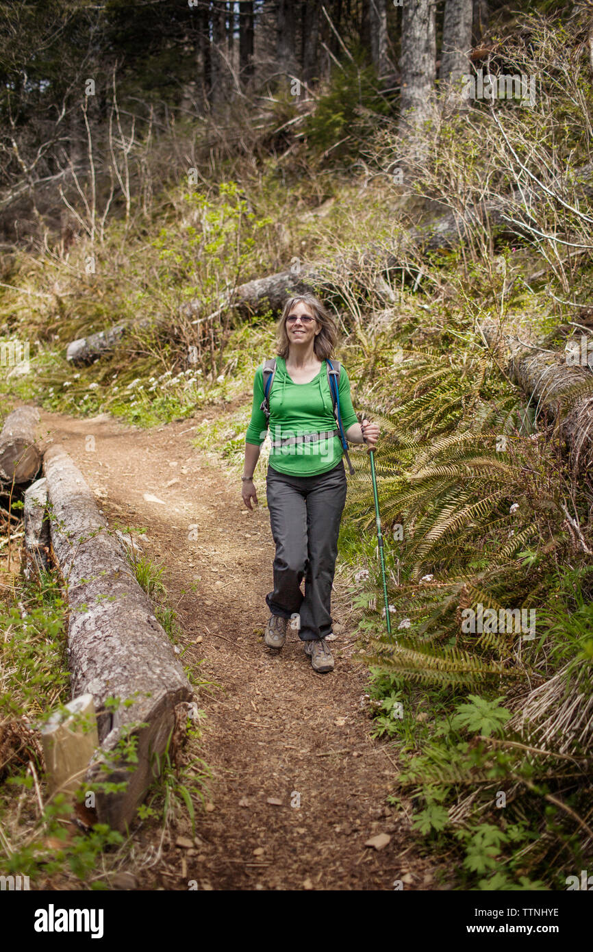 Happy hiking woman hi-res stock photography and images - Alamy