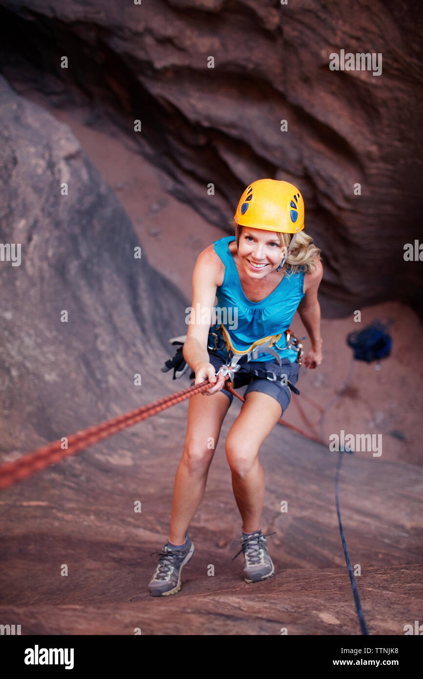 Old woman climbing rope hi-res stock photography and images - Alamy