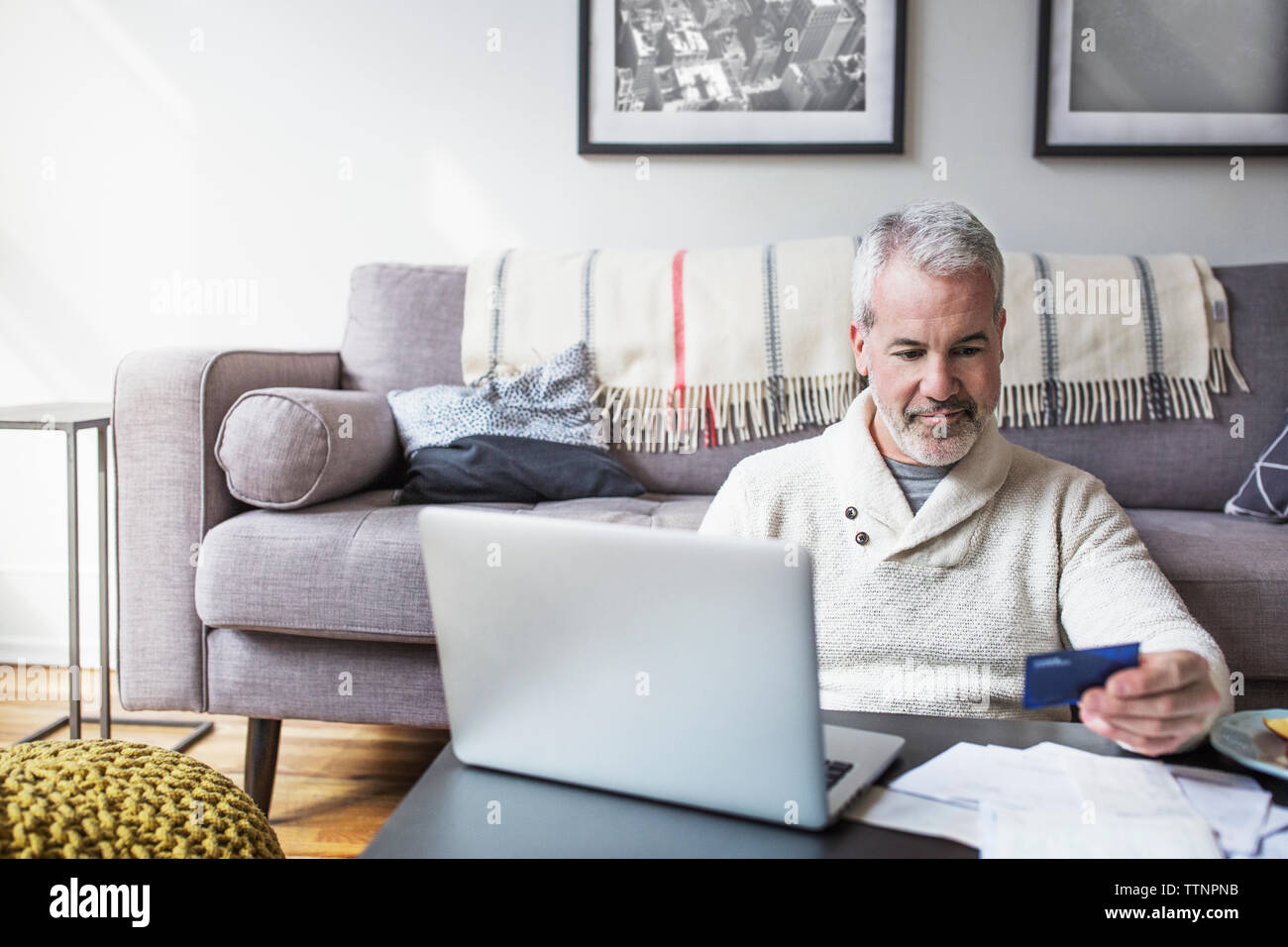 Mature man laptop shopping hi-res stock photography and images - Alamy