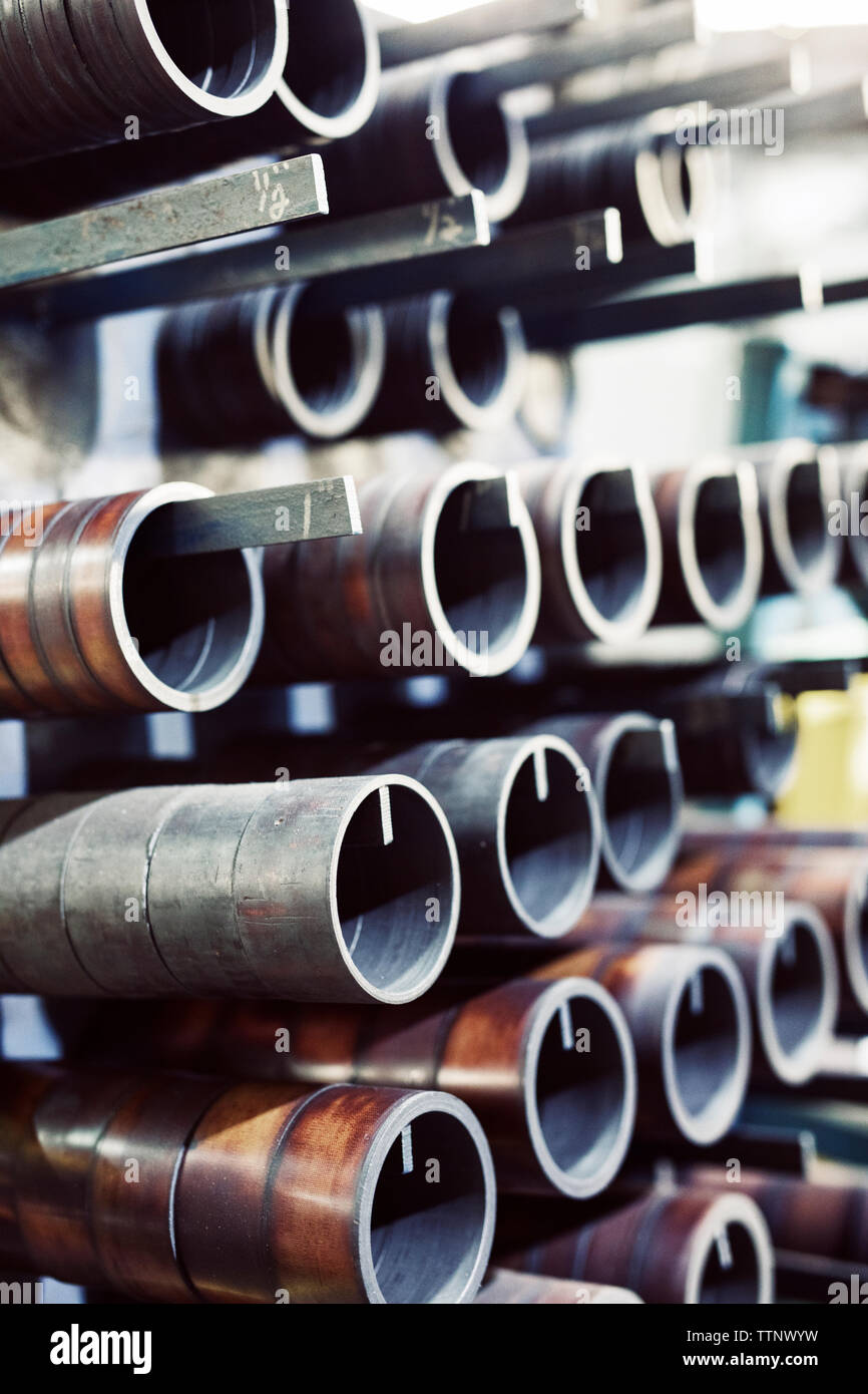 Close-up of metallic pipes hanging in industry Stock Photo - Alamy