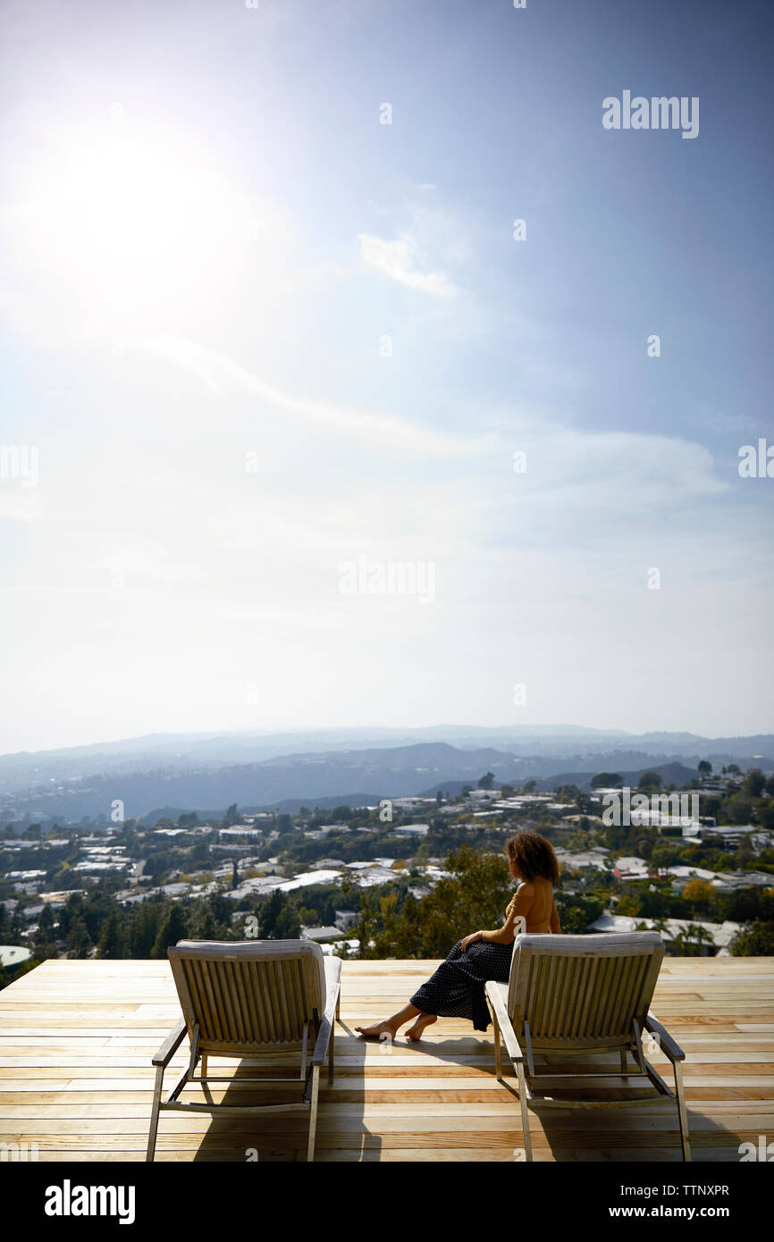 African woman side view sitting hi-res stock photography and images - Alamy