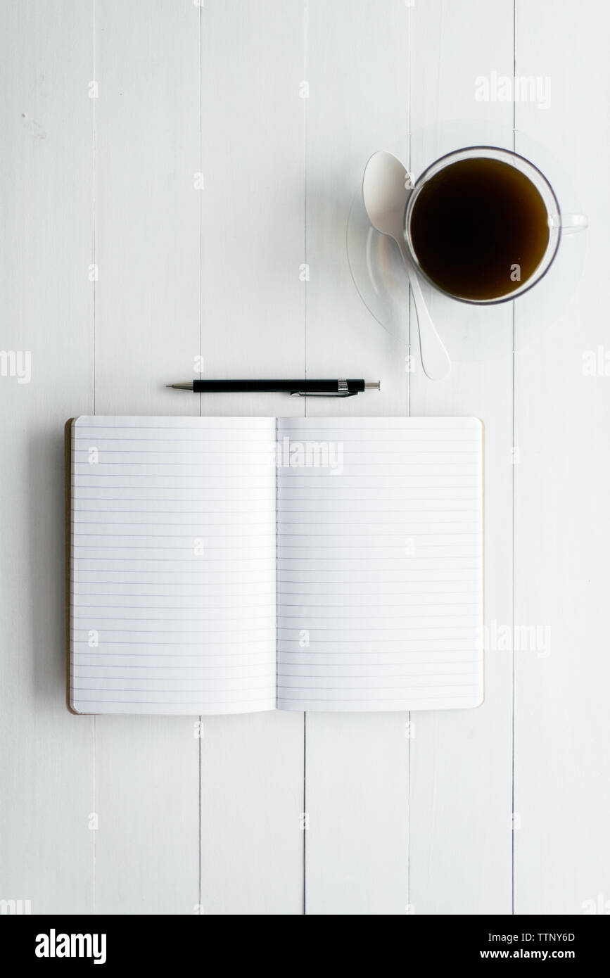 Open Notebook on Table Stock Photo