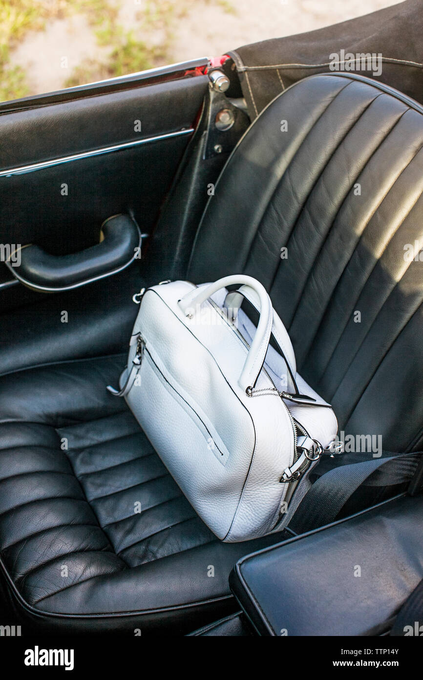High angle view of white bag on car seat Stock Photo