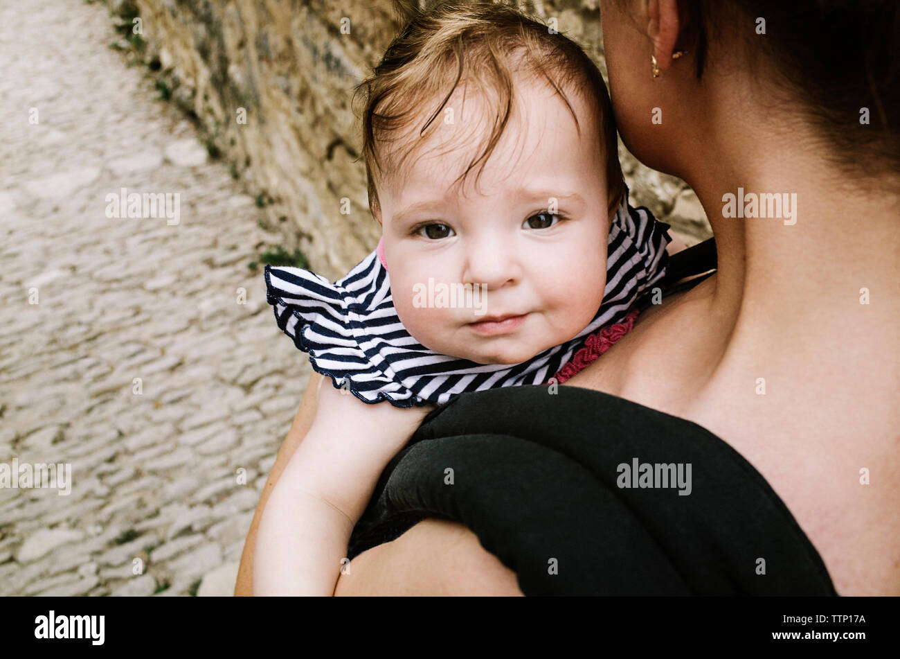 Baby girl smiling into camera hi-res stock photography and images - Alamy