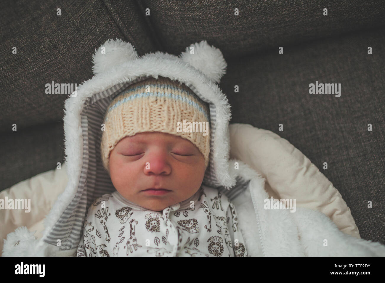 Overhead view of baby boy sleeping on sofa Stock Photo Alamy
