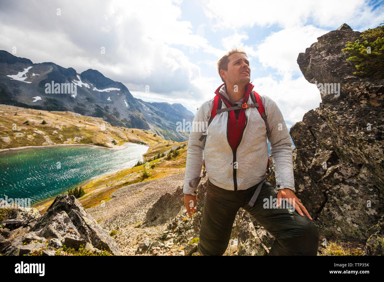 Hiker mountains lake hi-res stock photography and images - Alamy