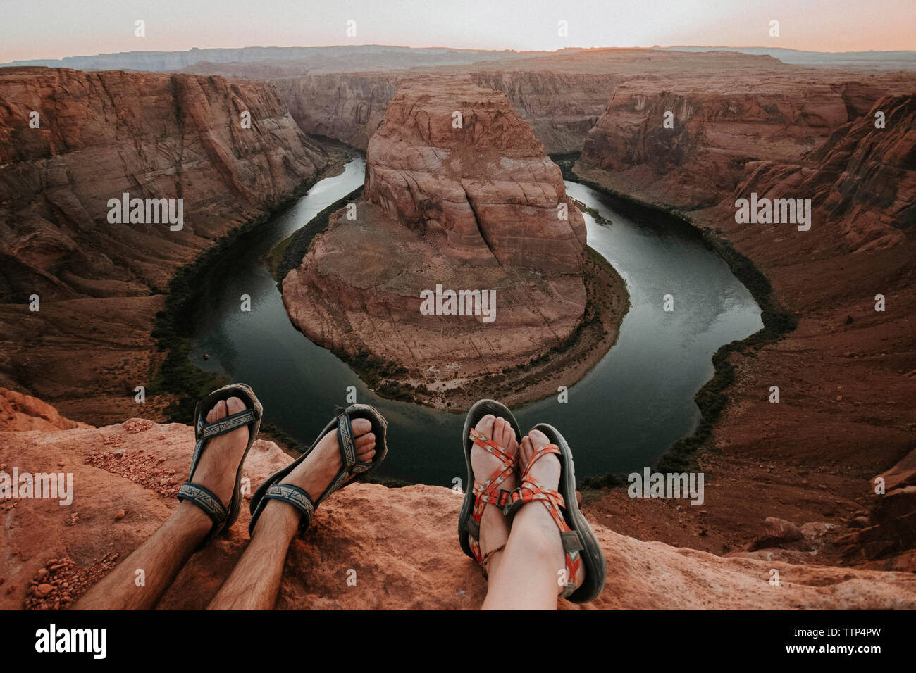 Low section of couple against Horseshoe Bend Stock Photo