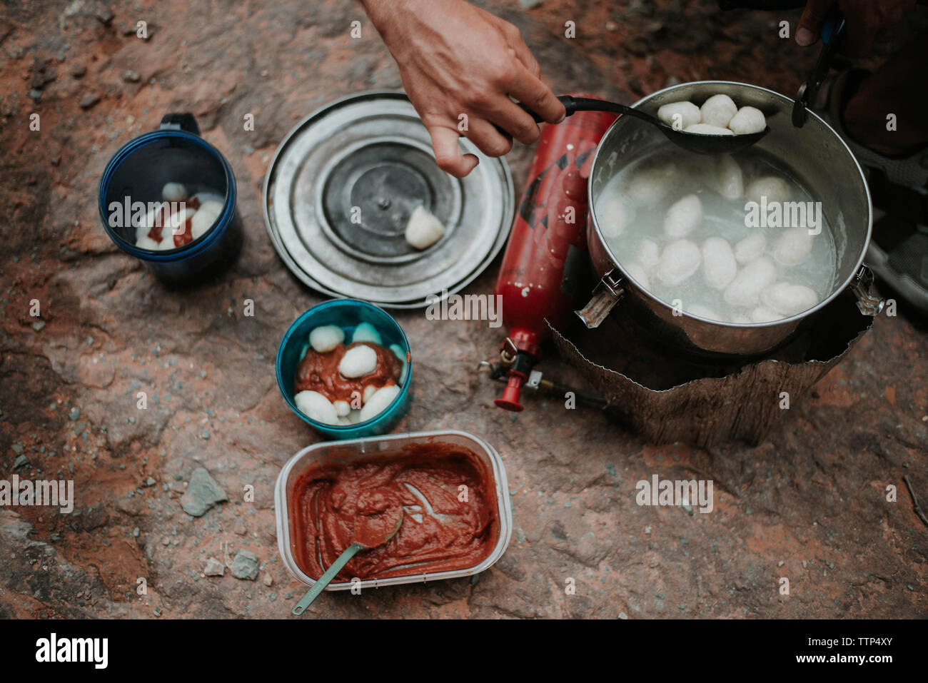 Cropped hand of man preparing food at Grand Canyon National Park Stock Photo