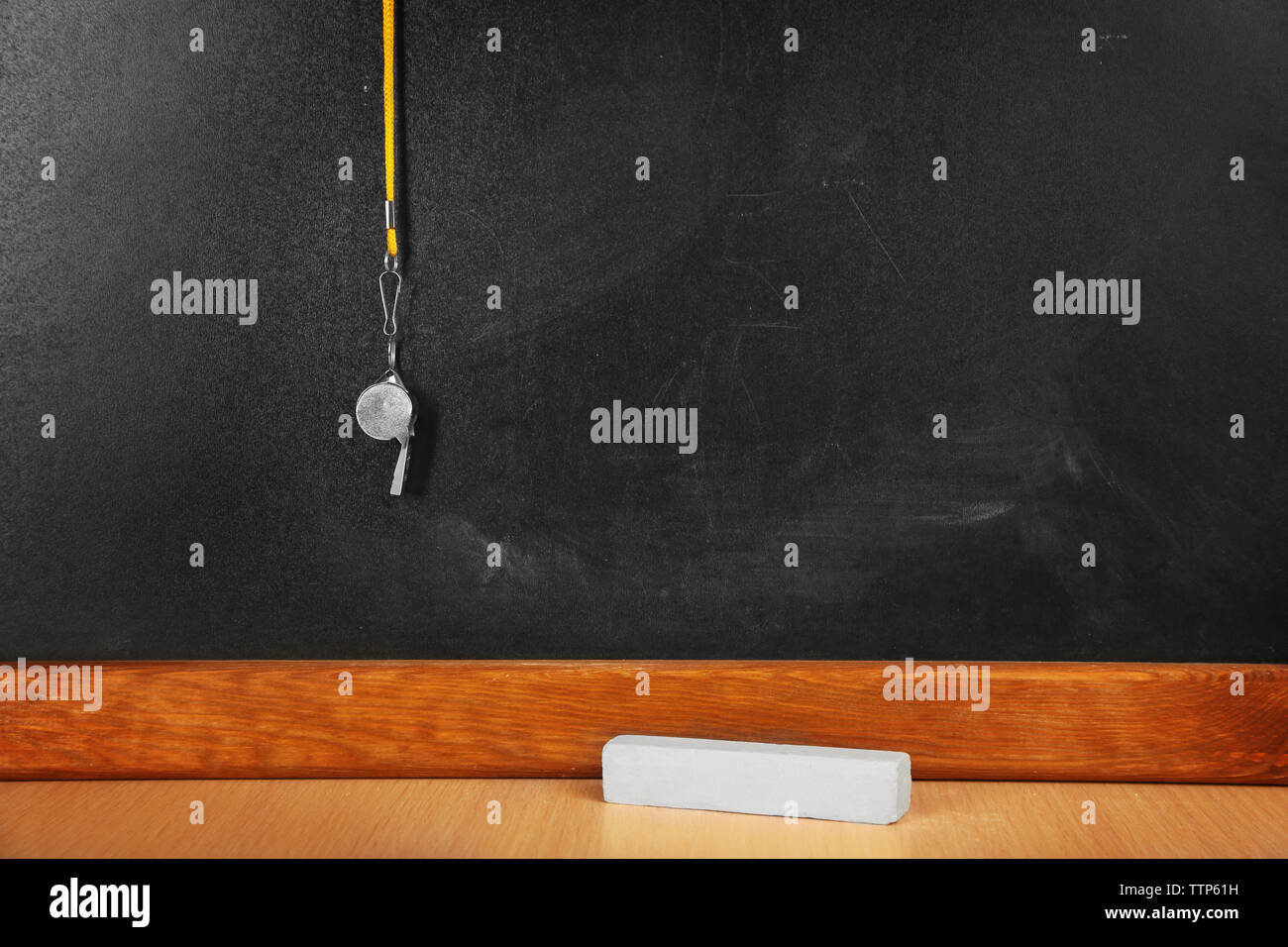 Whistle on blackboard background Stock Photo