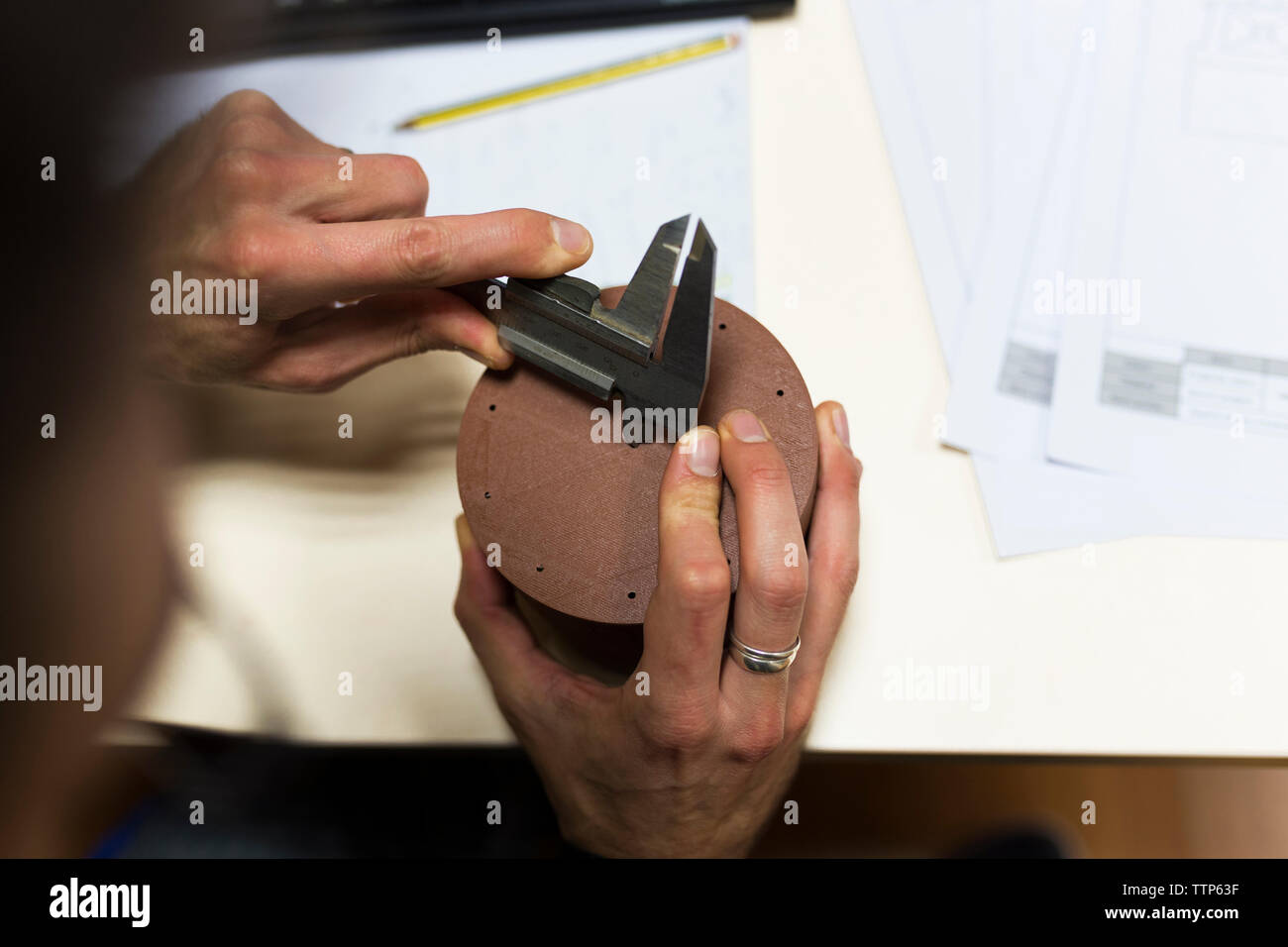 Cropped hands of engineer working on 3D printed design Stock Photo