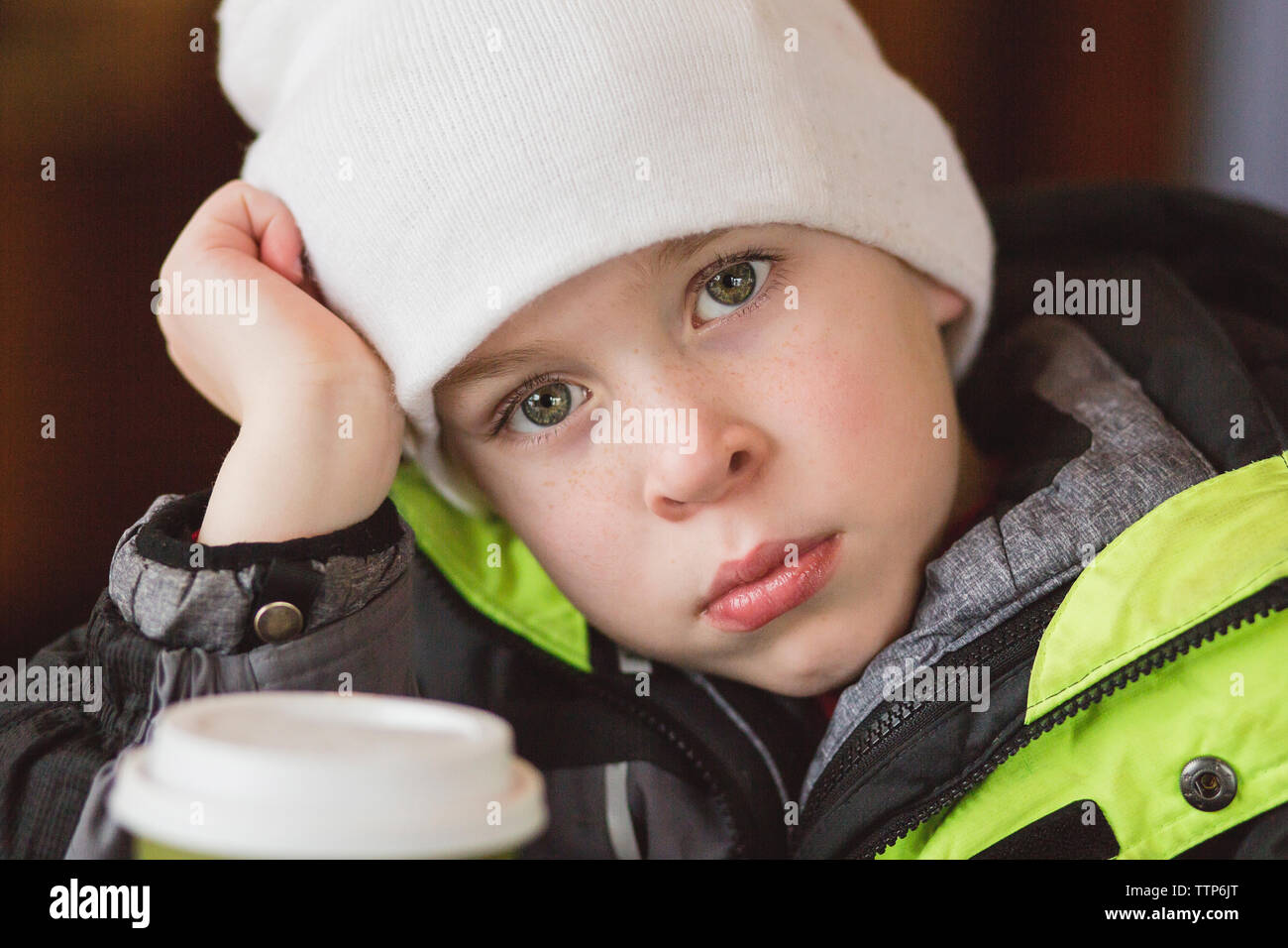 Portrait of angry boy wearing warm clothing Stock Photo