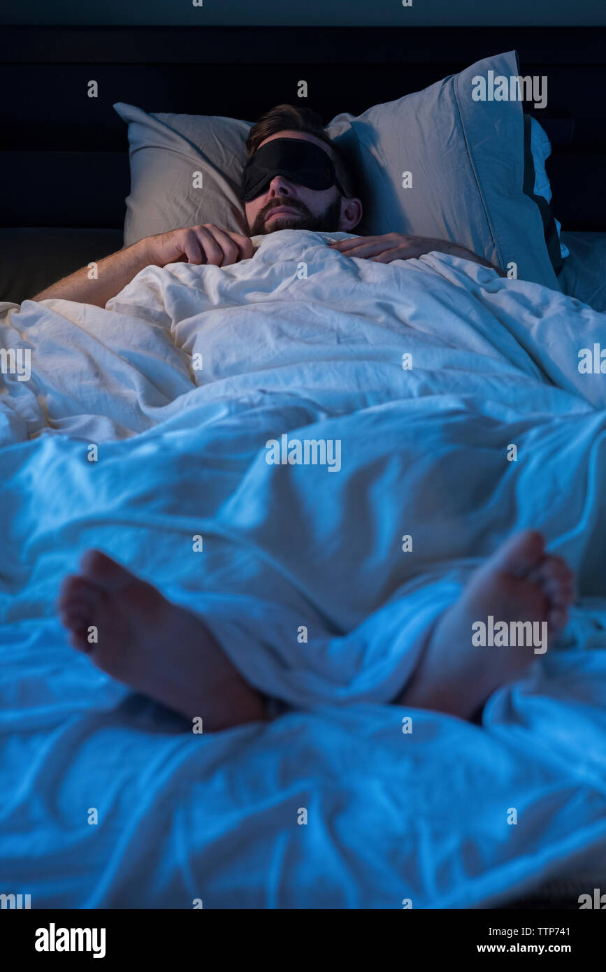 Man sleeping wearing eye mask hires stock photography and images Alamy