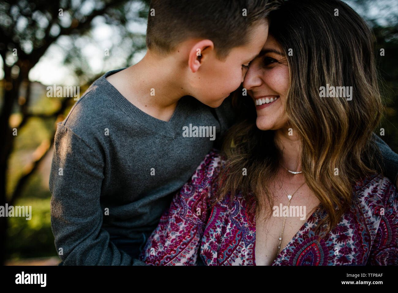 Mom and Son Nose to Nose Hugging and Smiling in SoCal Stock Photo - Alamy