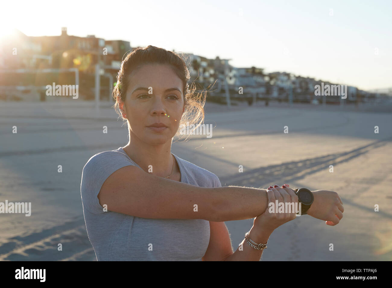 Woman stretching during training hi-res stock photography and images ...