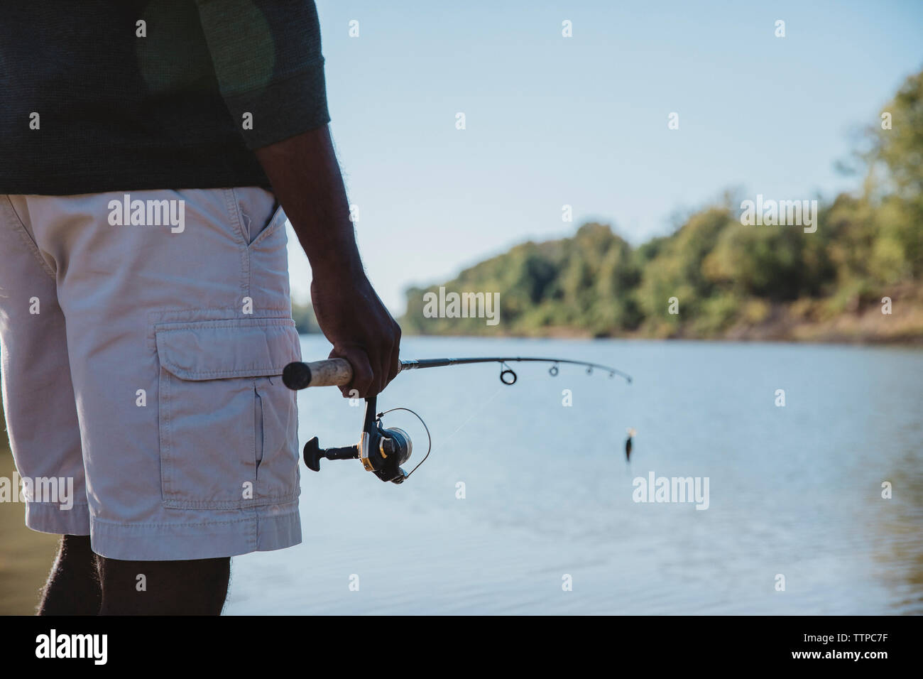 Fisherman fishing rod hi-res stock photography and images - Page 7 - Alamy