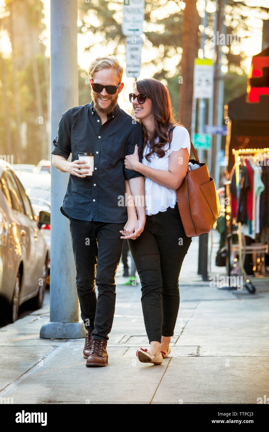 Young couple walking talking on hi-res stock photography and images - Alamy