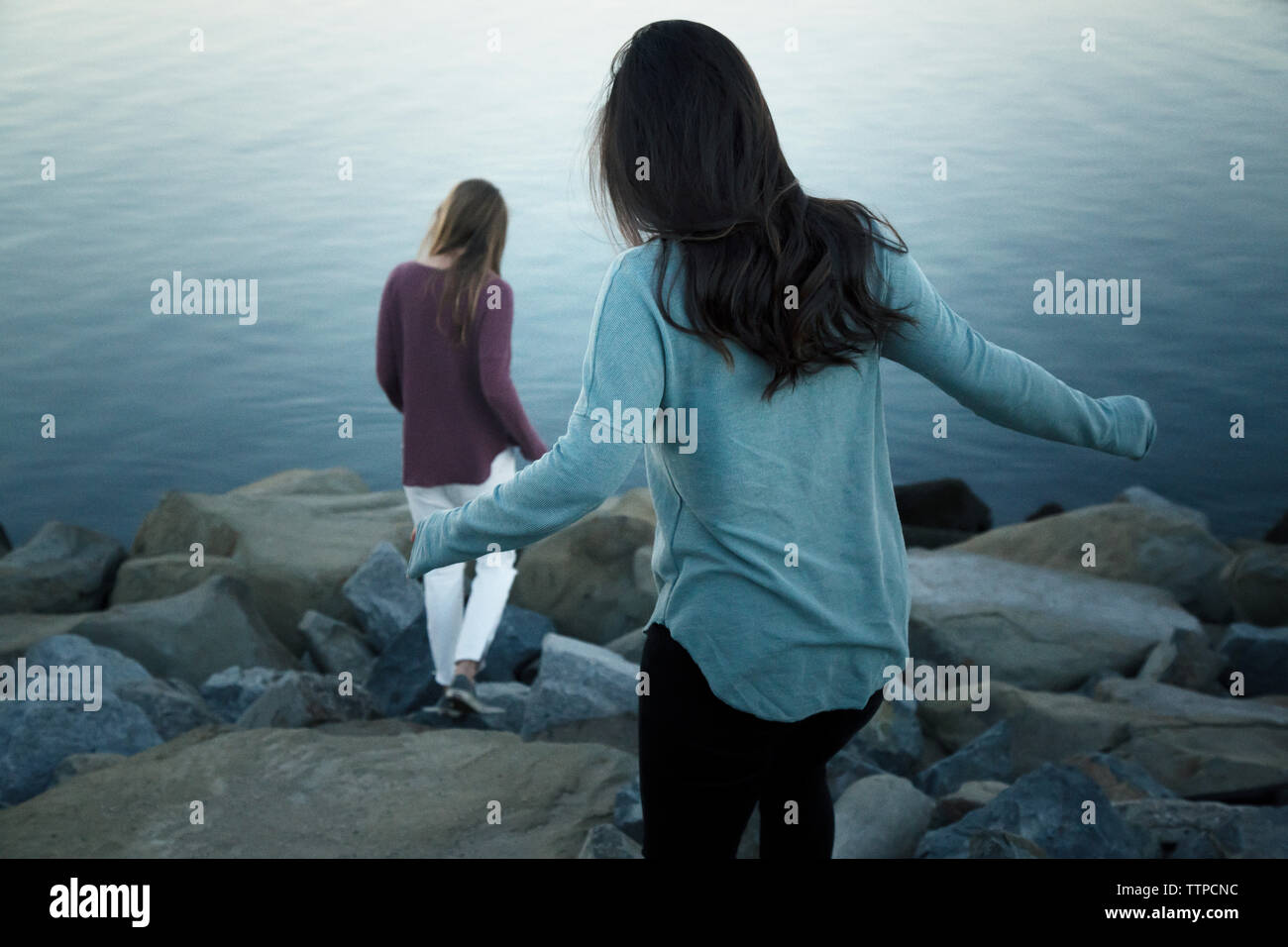 Friends three females rear view hi-res stock photography and images - Alamy