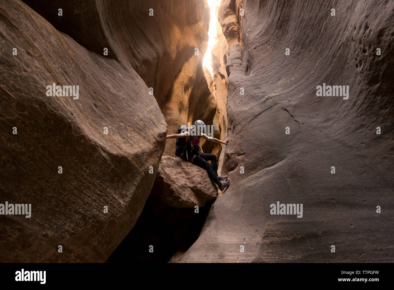 Female hiker helmet backpack hi-res stock photography and images - Alamy